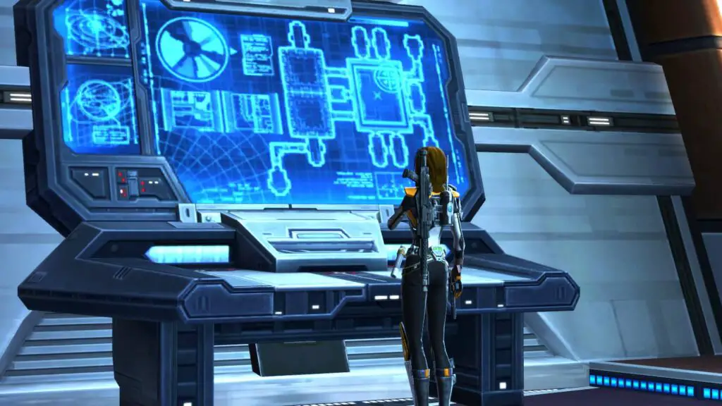 SWTOR Imperial Agent looks at huge monitor