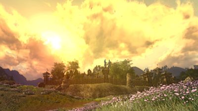 A settlement in the Great River zone of LOTRO during a bright, yellow dusk.